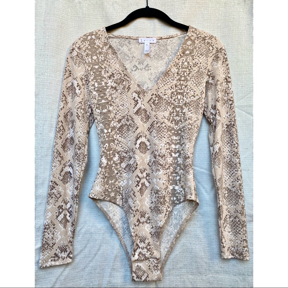 Beige, gray, white snakeskin bodysuit